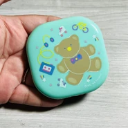 JustForFuncompactmirror.jpg (163 KB) A compact mirror that depicts the character.