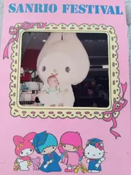A My Melody mascot carrying a baby in an old 1981 photo