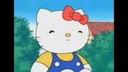 Kitty sitzt in der Sonne (ganzer Screenshot)