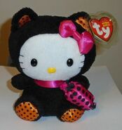 A plush toy of Hello Kitty dressed up as a black cat.