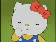 Hallo Kitty Augen geschlossen mit einem Lächeln