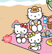 Kitty, Mimmy, and Mama having a picnic at the beach.