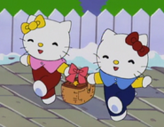 Kitty und Mimmy mit einem Korb