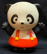 Promotional coin bank of the girl panda character.