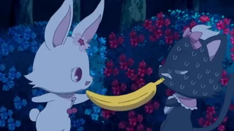 Ruby teasing Diana with a banana to scare her off