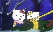 Kitty und Mimmy in einem Schlitten