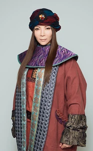 Ogi Kei as Minister Kes