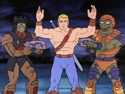 Lizorr and Hoove hold He-Man at gunpoint