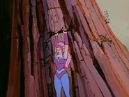 Glimmer grabs a branch.