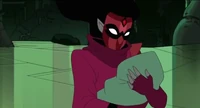 Shadow Weaver holding baby Adora.
