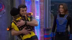Ray is hugged by Buddy