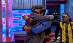 Henry and Ray share a hug