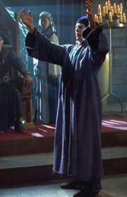 John Tass Parker as Minister