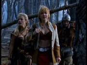  Gabrielle, Beowulf and Brunnhilda follow the tracks of Grindl through the woods to find Xena.