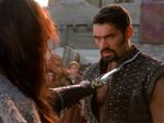 Xena threatens Ares with the Dagger of Helios. (XWP: "Seeds of Faith")