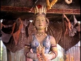 A statue of Demeter in "A Fistful of Dinars"