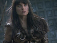 Callisto breaks Xena's spine with the Chakram (XWP: "The Ides of March")