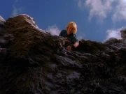 Xena's ashes tumble over cliff.