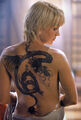 Gabrielle with her huge dragon tattoo on her back