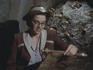 Mel Pappas reading one of The Xena Scrolls (XWP)