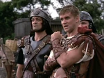 Carminus and Pompey discuss their next move on the Amazons. (XWP: "Endgame")