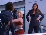 Alti hands gab to police.jpg (93 KB) Alti hands the Gabrielle Clone over to the Police (XWP: "Send in the Clones")