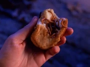 Gabrielle and Xena discover infested food with maggots.