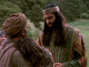 Xena and Gabrielle watch Eli heal a little girl.