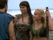 Xena and Gabrielle meet Ulysses at the beach.