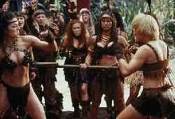 Amazon High Queen  and  Amazon Queen  in a hand-to-hand royal combat