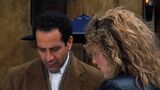 Sharona showing Adrian her notes.