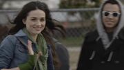 Allison waving at Scott