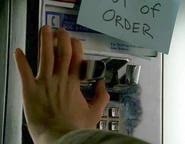 Micah exercises his power to use a broken telephone with a single touch. (Nothing to Hide)