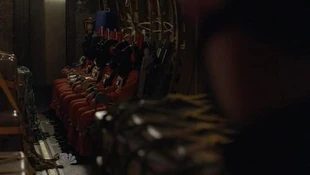 Hooded prisoners being watched by a guard. From up to down:Hooded fugitive, Hiro, Tracy, hooded fugitive, hooded fugitive and Sparrow Redhouse