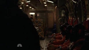 Hooded prisoners inside the plane. Up to down in order:Matt, female fugitive, hooded fugitive, Peter, Mohinder and hooded fugitive