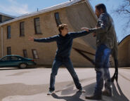 Tommy teleports Luke away from him.