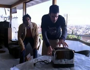 After taking the power, Sylar demonstrates it to Mohinder by holding his hand over a toaster...