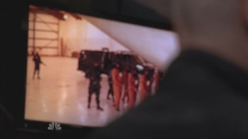 The hooded fugitives boarding the plane