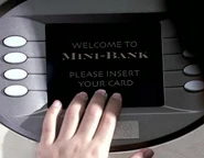 Micah communicates with an ATM, and convinces it to dispense a load of cash. (The Fix)