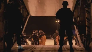 Prisoners boarding the plane