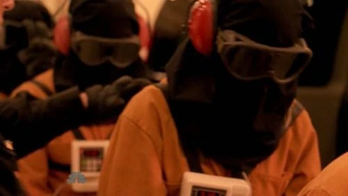 Tracy, male fugitive (or Flint) and female fugitive 2 being readied