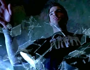 Sylar hovering shards of glass