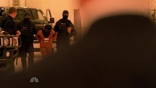 A hooded Claire is brought to Nathan