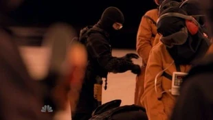 Prisoners being readied. First two prisoners are most likely Matt and female fugitive