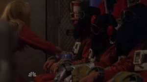 A hooded Hiro in the middle