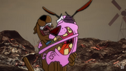 Courage leaping into Scooby-Doo's arms as they both scream in fear.