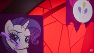 Discord arriving on the scene and flying through the banner of Rarity.