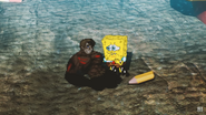 SpongeBob crying over Super Friends Aquaman's inevitable fate.