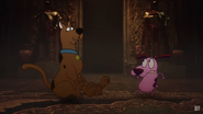 Courage and Scooby-Doo realizing they have just bumped into an old friend.