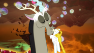Discord wiping his mouth with a napkin.